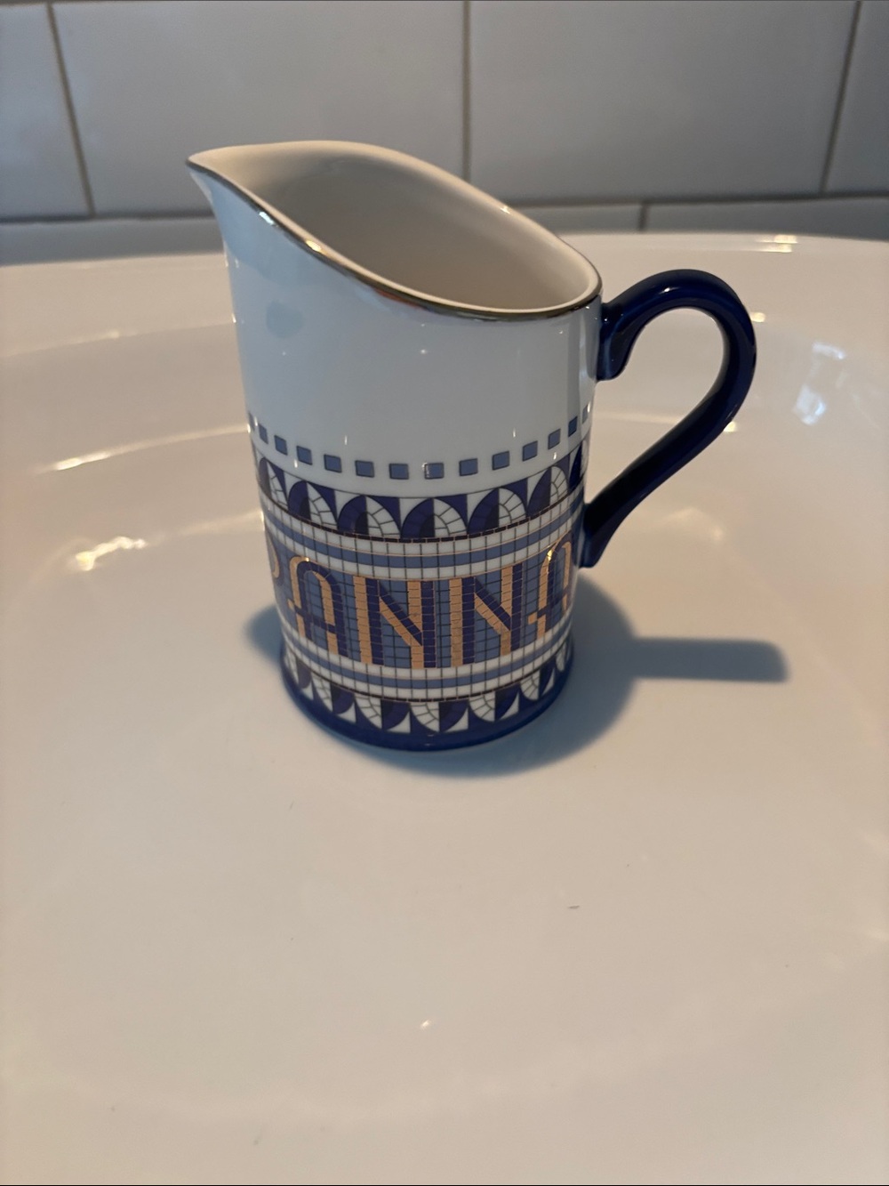 Anthropologie Panna creamer with gold accents